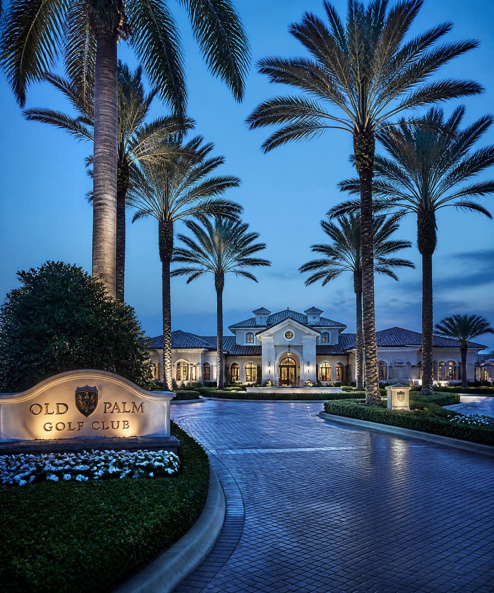 Private Palm Beach Gardens country club entrance at blue hour
